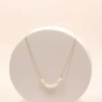 collier femme or laminé et perles d'eau douce