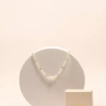 collier perles d'eau douce et or laminé